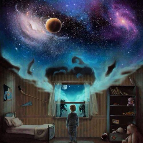 Dreaming child looking at galaxies